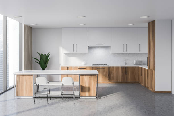 istock White and wooden kitchen with bar 1136467078