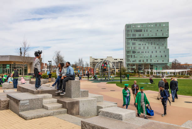 Charlotte, NC, USA-3/16/19: A busy 1st Ward Park on a sunny spring day.