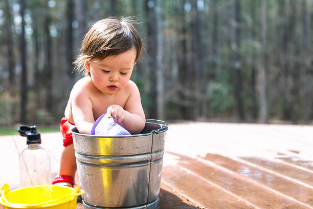 istock Happy toddler boy playing outside 1136476924