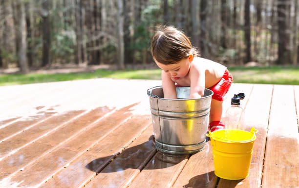 istock Happy toddler boy playing outside 1136476938