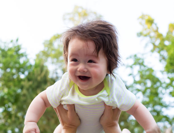 istock Happy baby boy outside 1136476964