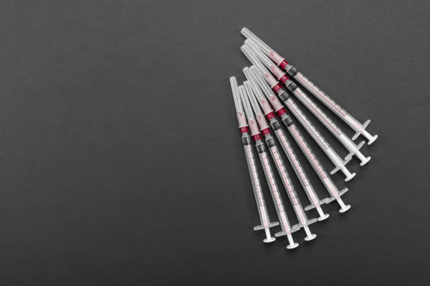 istock 1-ml syringes isolated on a bright background 1136477055
