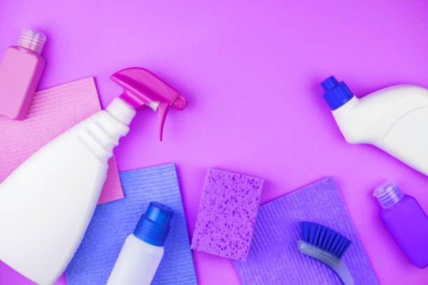 istock House cleaning products are on purple background. 1136478140