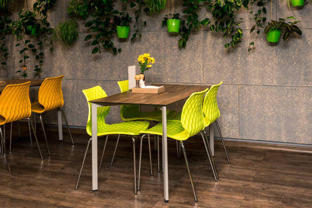 istock modern cafe interior, colorful table and chairs 1136483814