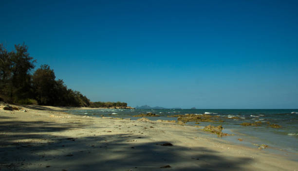 istock Beautiful tropical beach and sea 1136498015