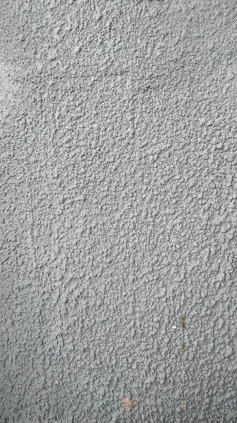 istock The stucco wall is painted in gray paint. 1136498987