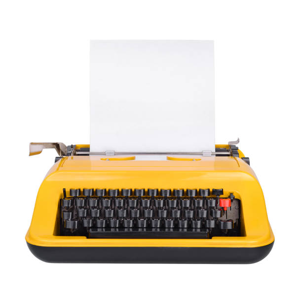 machine à écrire jaune d'isolement sur le blanc - typewriter key zero antique typewriter photos et images de collection