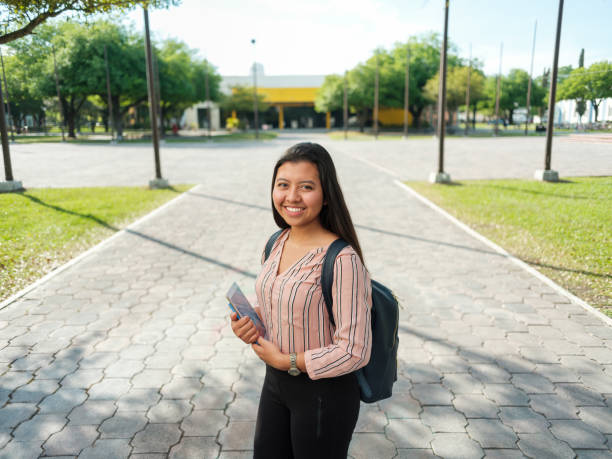 istock Latin female student smiling 1136501767