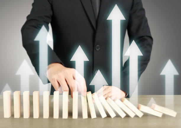 istock Stopping domino concept 1136502597