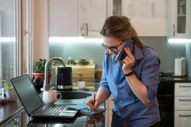 istock Business woman in kitchen. 1136503527