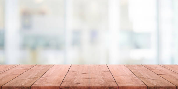 istock Empty wood table top and blurred abstract restaurant interior background - can used for display or montage your products. 1136503543