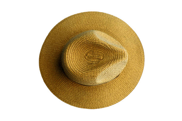 istock Top view vintage pretty straw hat isolated on white background 1136504604