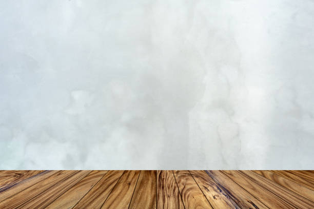 istock Top wooden table wall on background 1136505545