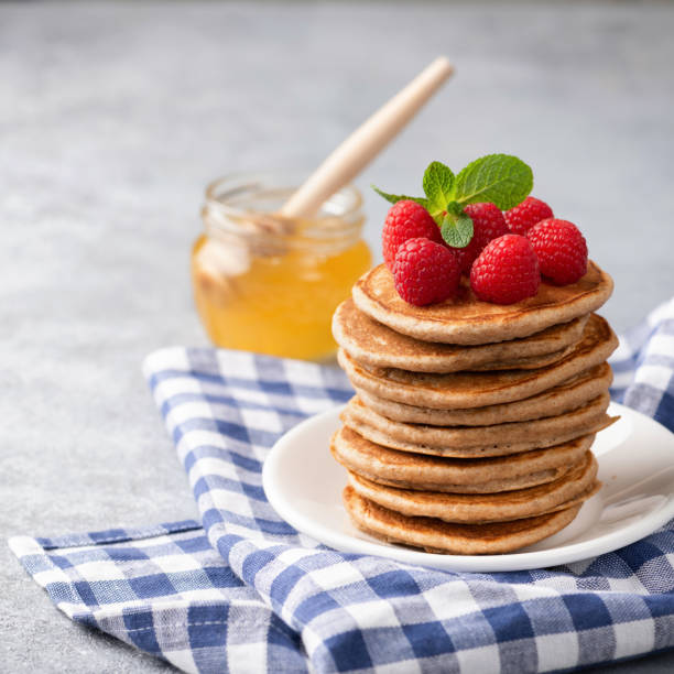 istock Whole wheat pancakes with berries 1136505823