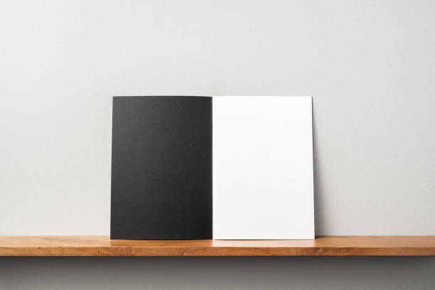 istock front view of black magazine stand on bookshelf 1136507714