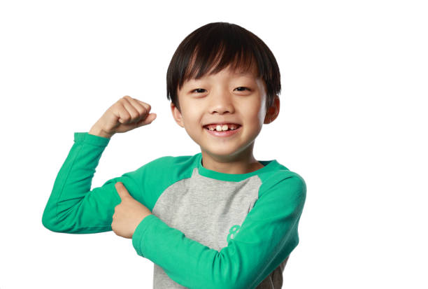 istock Studio portrait of boy 1136508511
