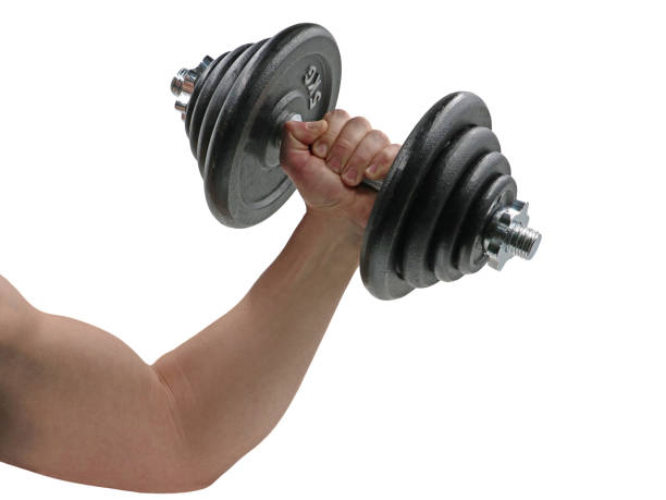 Hand holding heavy black dumbbell isolated on white background.