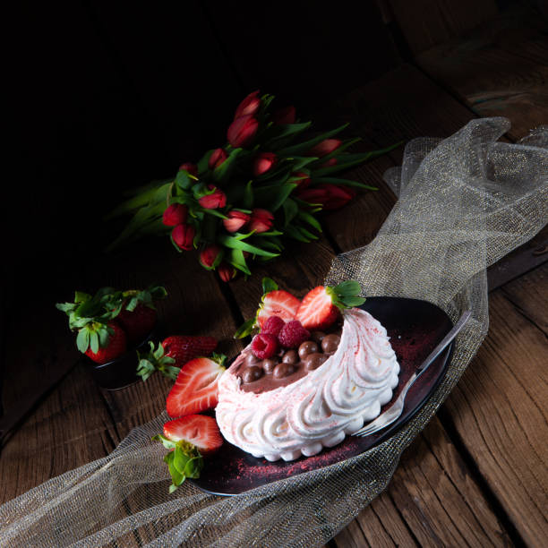 istock light pavlova with fresh fruits and chocolate 1136515293