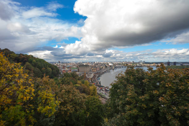 istock Panoramic view of Podil district, Poshtova Square and Dnieper river with dramatic sky 1136516341