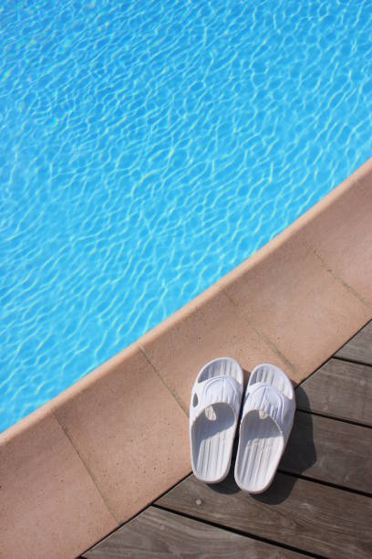 istock Poolside  Sandals Plastic  Holiday Resort 1136519592