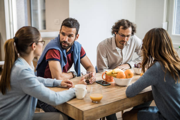 istock Small group of freelancers talking on a break in cafeteria. 1136521906