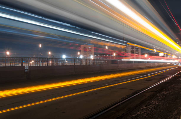 istock motion night lights in the city. tram traffic 1136522068
