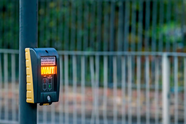 istock Pedestrian button with wait signal on a crossing 1136522079
