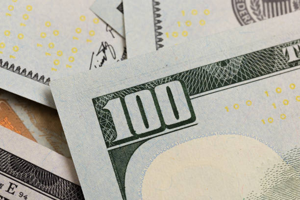 istock US hundred  Dollar elements , super macro, close up photo 1136523468
