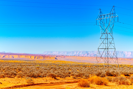 Azirona landscape the American Southwest. Hi -Power Transmisson electric  Line on the green fields. USA.