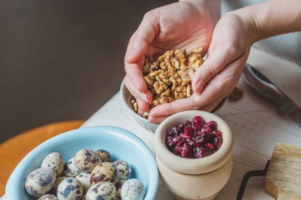 istock Homemade recipe - walnut, quail egg, dried cranberries 1136524443