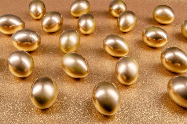 istock golden easter eggs on a golden background 1136524842