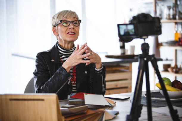istock Woman recording video for her vlog 1136525879