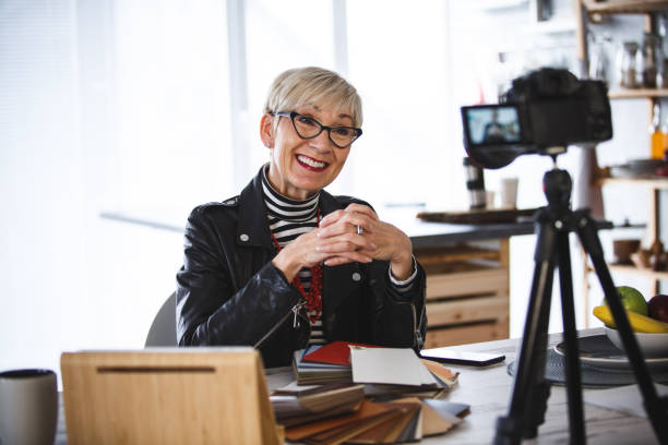 istock Woman recording video for her vlog 1136525882