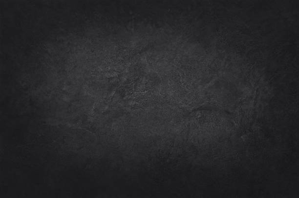 istock Dark grey black slate texture in natural pattern with high resolution for background and design art work. Black stone wall. 1136529317