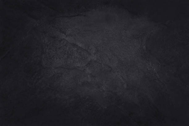 istock Dark grey black slate texture in natural pattern with high resolution for background and design art work. Black stone wall. 1136529721