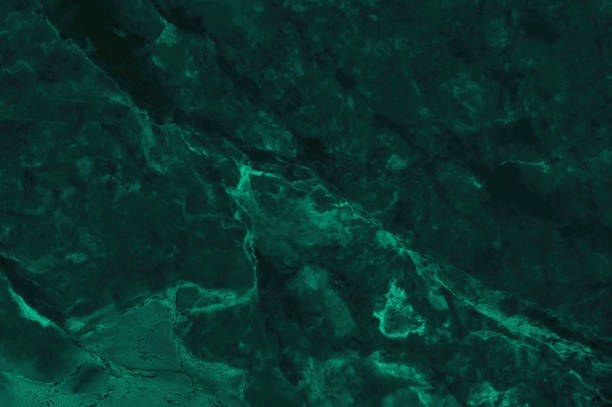 Photo of Dark green marble texture background with high resolution, top view of natural tiles stone in luxury and seamless glitter pattern.