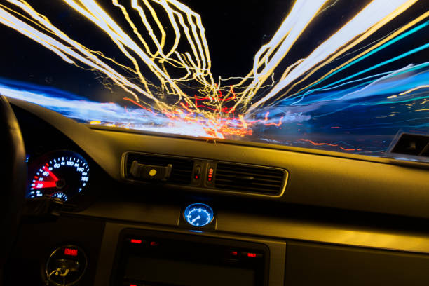 istock Car running in the night 1136530174