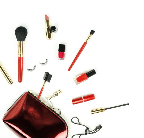 istock Makeup cosmetic products top view  ,brushes set , lipstick,  cosmetic bag top view on white background. Professional decorative makeup tools . Women accessories. Flat lay. Copy space 1136531463