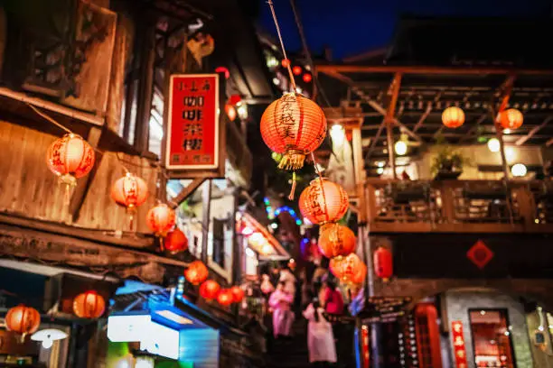 Typical taiwanese red lanterns in the alleys and streets of Jiufen at night. Selective Focus. Jioufen, Taiwan, Asia