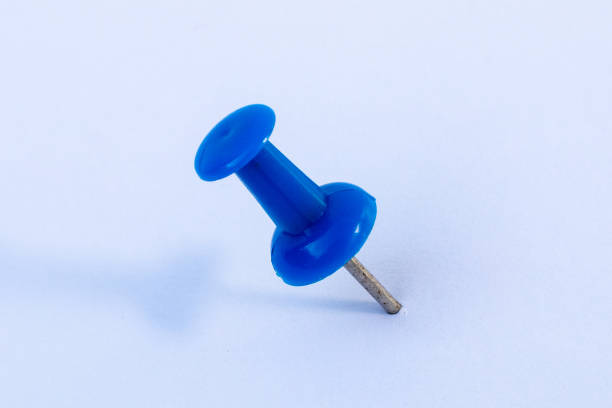 istock Blue Push Pin thumb tack isolated 1136532769