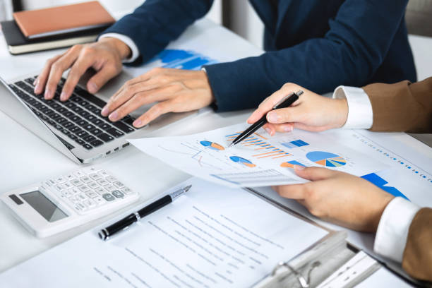 istock Business People Working On Desk 1136535029