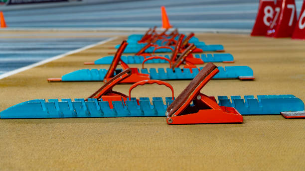 istock Action packed image; the starting blocks for a sprint run on a track 1136537947