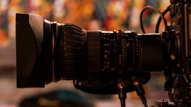 istock Professional digital video camera. accessories for 4k video cameras. tv camera in a stadium 1136537954
