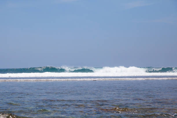 istock Big sea wave in the distance. 1136541153