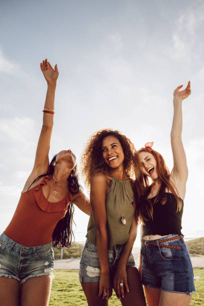 istock Female friends enjoying summer holidays 1136551276