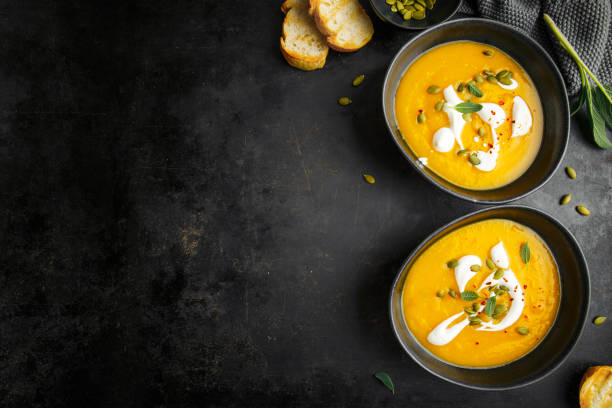 istock Pumpkin creamy soup served in bowl 1136553912