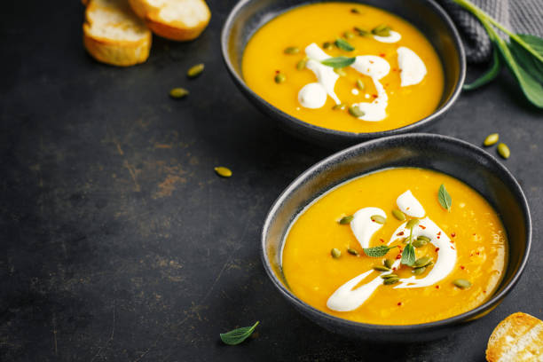 istock Pumpkin creamy soup served in bowl 1136554068
