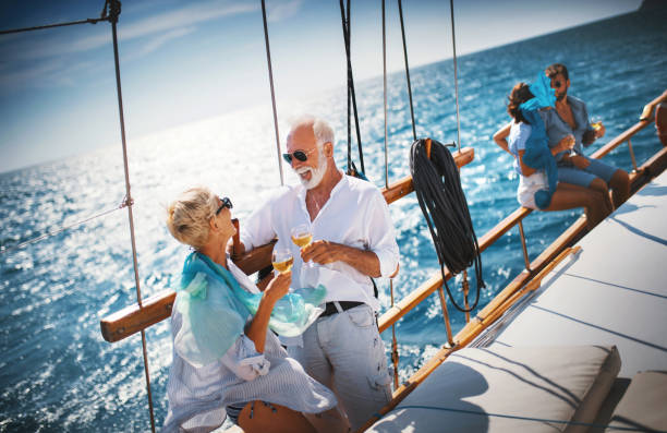 istock Senior couple on a sailing cruise. 1136555075