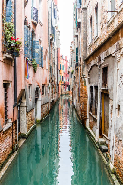 istock Beatiful and empty canal in Venice, Italy 1136557515