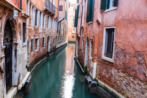 istock Beatiful and empty canal in Venice, Italy 1136557531